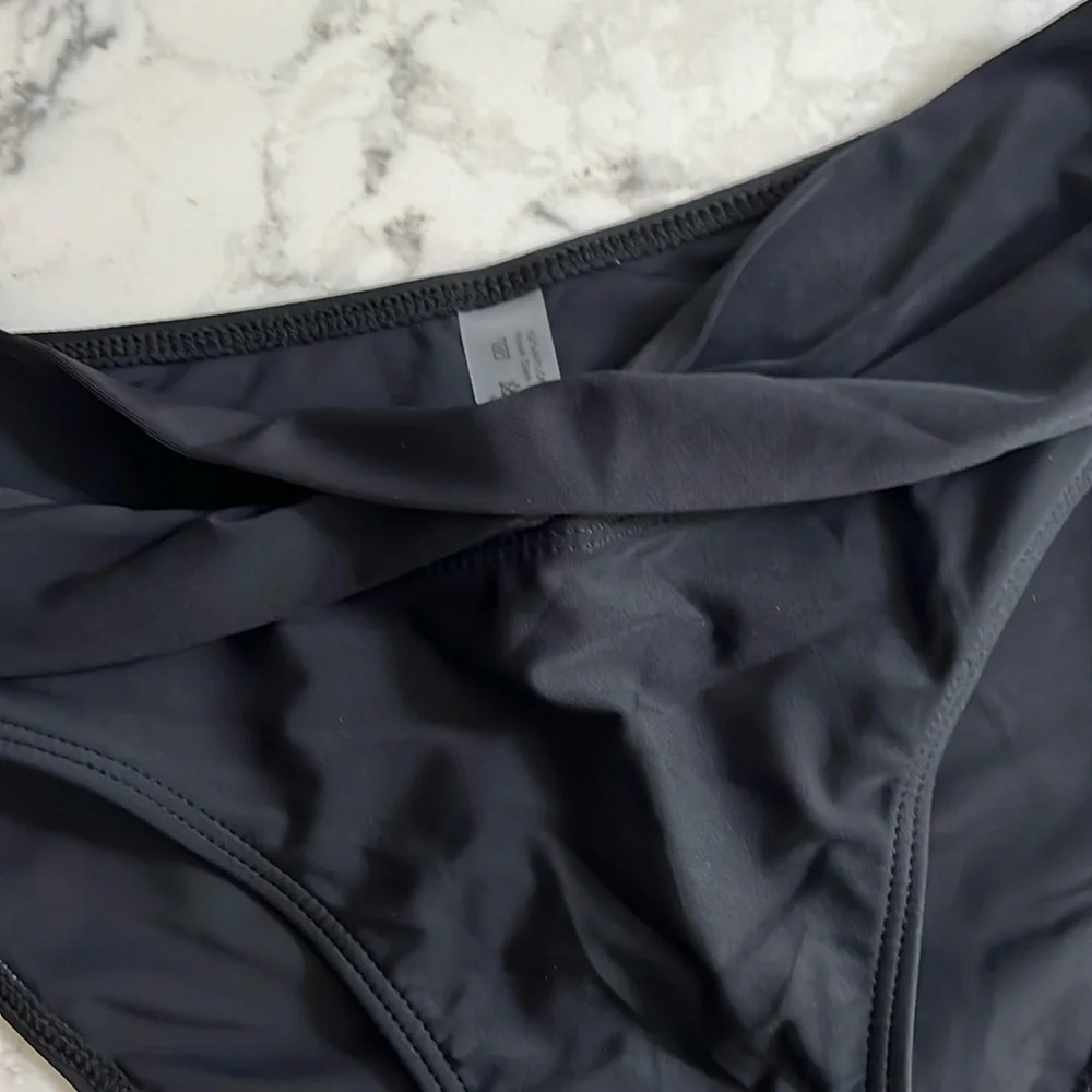 NWT High Cut Bikini Bottom Black Size small  Cross front bottom only